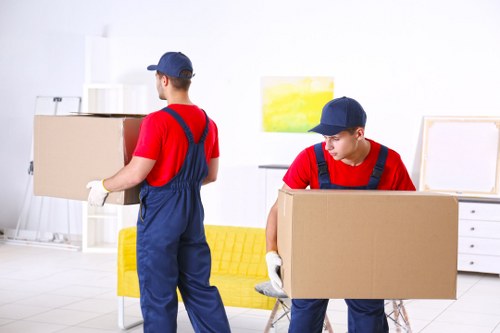 Man with Van loading household items for storage in Enfield