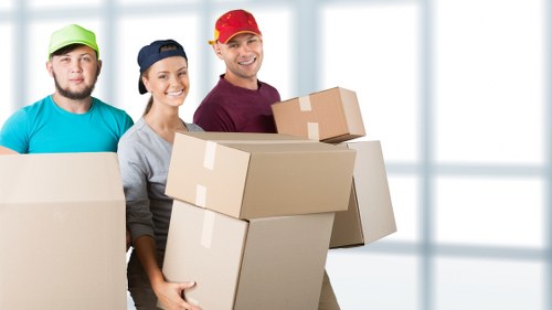Carefully wrapped furniture pieces ready for move