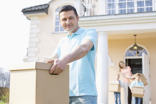 Professional packing team handling household items in Storage Enfield